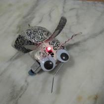 Sylvia's mousey the junkbot with red indicator led