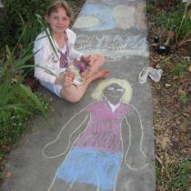 Sylvia with chalk drawing of herself