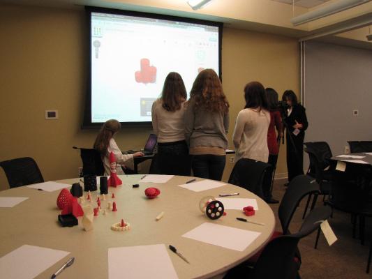 Sylvia teaches girls about 3D printing and Tinkercad.