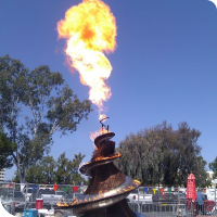 A fire sculpture erupting flames