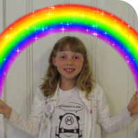 Sylvia holding a rainbow