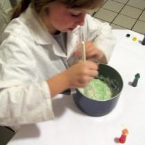 Sylvia mixes the conductive dough ingredients together in a pot